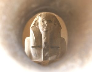 Djoser Statue viewed through the offering Hole at Saqqara in Egypt
